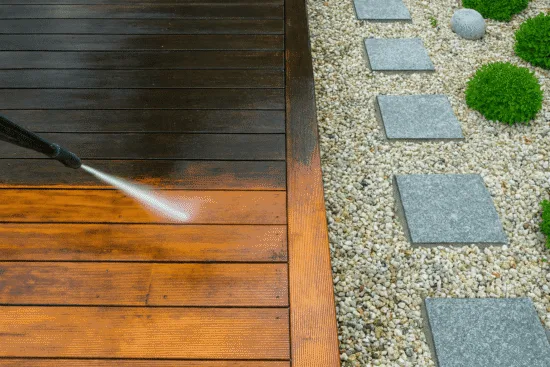 Pressure washing a dirty deck